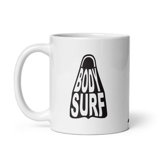 Playful mug perfect for bodysurfers or ocean lovers, showcasing a white, shiny ceramic base with a cool bodysurf fin detail in multiple colors. black